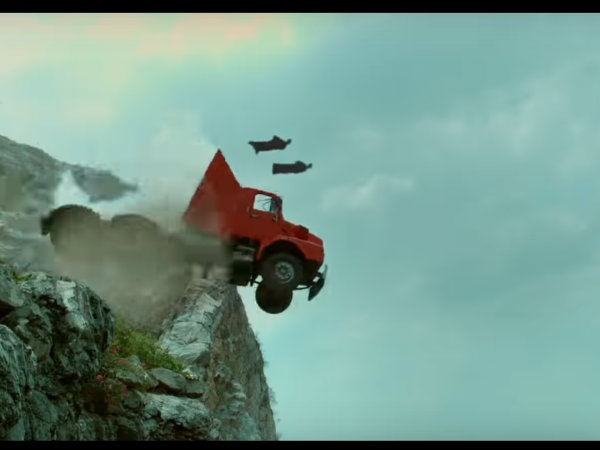 In this scene, the red color truck falls into the trench and two people sitting on it bounce in the air before the truck falls. Salman Khan,Salman Khan race 3,race 3 funny mistakes,race 3 mistakes,race 3 movie mistakes,Salman Khan movie mistakes,movie mistakes