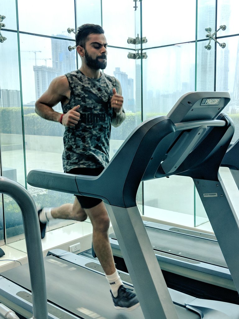 India captain Virat Kohli posted pics with the caption: "Today's session included a lot of band work for lower body strengthening; including lateral band walk, monster walk and then striding a distance of 80 meters x 12 repetitions at speed of 16km/hr on treadmill. 15 second break between each stride and completing 2 sets of 12". Virat Kohli,India Virat Kohli,virat kohli captain,Virat Kohli fitness goals,Virat Kohli workout,Virat Kohli workout pics,Virat Kohli workout images,Virat Kohli workout stills,Virat Kohli workout pictures,Virat Kohli workout photos
