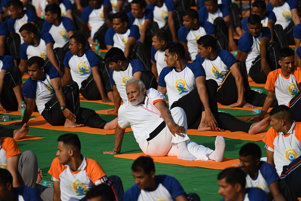 "Yoga is beautiful because it is ancient yet modern, it is constant yet evolving. It has the best of our past and presents and a ray of hope for our future. In Yoga, we have the perfect solution to the problems we face, either as individuals or in our society. India is Yoga's top ambassador," he said. Talking about India's role in promoting yoga, he said India should be honoured to be the "guardians of the great practice." International Yoga Day 2018,International Yoga Day,Yoga Day 2018,Narendra Modi,Modi performs Asanas,Modi performs yoga,Modi doing yoga