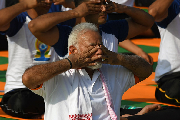 "We should be proud of our culture. On the contrary, if we doubt our tradition and culture then the world will not put its faith in us," Prime Minister Modi added. Along with the Prime Minister, around 50,000 yoga enthusiasts kick-started the India's International Yoga Day celebrations at Dehradun-based Forest Research Institute today. International Yoga Day 2018,International Yoga Day,Yoga Day 2018,Narendra Modi,Modi performs Asanas,Modi performs yoga,Modi doing yoga