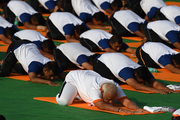 The idea of International Day of Yoga was first proposed by Prime Minister Modi during his speech at the United Nations General Assembly (UNGA) on 27 September 2014. International Yoga Day 2018,International Yoga Day,Yoga Day 2018,Narendra Modi,Modi performs Asanas,Modi performs yoga,Modi doing yoga
