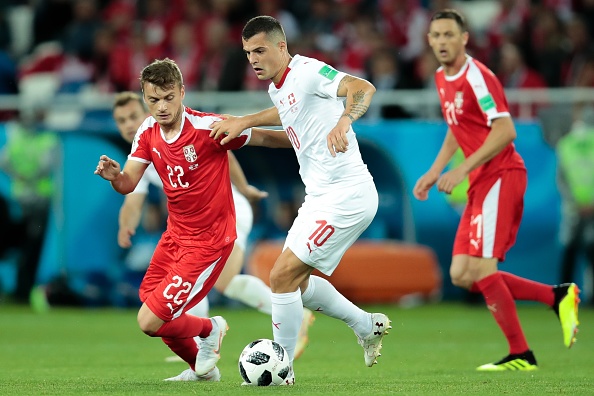 But despite being under considerable pressure, the Serbian defence prevented the Swiss from creating too many clear chances in the first half. Switzerland finally made their domination count when Shaqiri's shot was bloc ked by the Serbian defence. Xhaka pounced on the loose ball and unleashed a first time attempt from outs ide the penalty box which beat Serbia goalkeeper Vladimir Stojkovic with its pace and vicious swing before bulging the net. Xhaka is the third Swiss player to score in more than one World Cup tournament. He follows in the footsteps of former stars Jacques Fatton and Andre Abegglen. Abegglen scored in the 1934 and 1938 World Cups while Fatton scored at the 1950 and 1954 editions. Switzerland beat Serbia,Switzerland vs Serbia,Switzerland beat Serbia by 2-1,FIFA World Cup,FIFA World Cup 2018,Group E clash,Kaliningrad Stadium