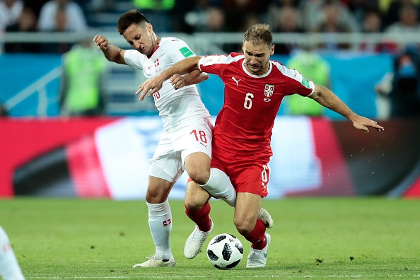 Adem Ljajic of Serbia and Granit Xhaka of Switzerland in action during the 2018 FIFA World Cup Russia group E match between Serbia and Switzerland at the Kaliningrad Stadium in Kaliningrad, Russia, on June 22, 2018. Switzerland beat Serbia,Switzerland vs Serbia,Switzerland beat Serbia by 2-1,FIFA World Cup,FIFA World Cup 2018,Group E clash,Kaliningrad Stadium