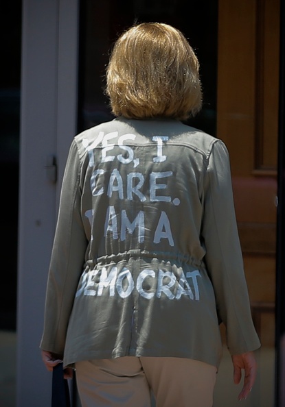 Hours after the photo of her departure outfit went viral, she again donned the jacket to disembark the plane at an Air Force base outside Washington. She ignored question from reporters as she entered the presidential motorcade. Melania Trump,US First Lady Melania Trump,Melania Trump first lady,I really don't care,Melania Trump wears 'I really don't care' coat