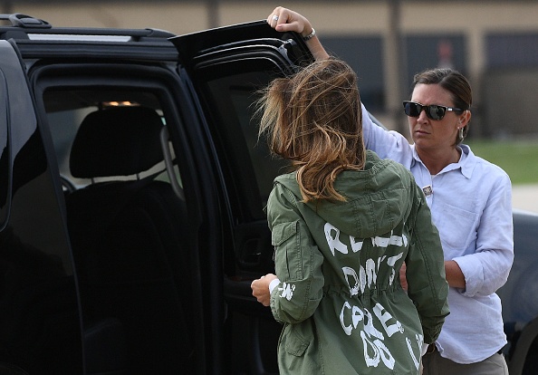 Melania Trump's spokeswoman Stephanie Grisham lambasted US media on Twitter for focusing on her fashion choice. Trump was not seen wearing the coat when she first arrived in Texas, but had it on again when she returned to Washington. Melania Trump,US First Lady Melania Trump,Melania Trump first lady,I really don't care,Melania Trump wears 'I really don't care' coat