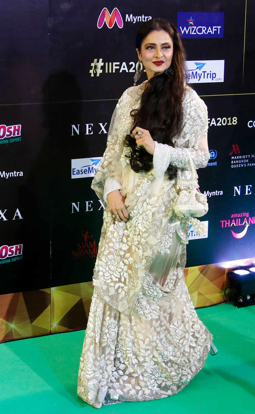 Rekha gets clicked on her arrival at 19th edition of International Indian Film Academy (IIFA) awards in Bangkok, Thailand. IIFA Awards 2018,IIFA Awards,Arjun Kapoor,Kriti Sanon,Radhika Apte,Shraddha Kapoor,Rekha,Nawazuddin Siddiqui,Rahul Bose,celebs at IIFA Awards 2018,IIFA Awards 2018 pics,IIFA Awards 2018 images,IIFA Awards 2018 stills,IIFA Awards 2018 pictures,IIFA Awards