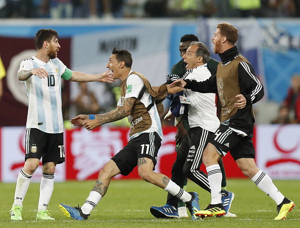 Messi then provided a delectable bass from the right with a cross which put Gonzalo Higuain on one-one-one situation with goalkeeper Francis Uzoho but the Juventus centre-forward couldn't overcome the Nigerian goalminder in the 27th minute. The Argentina captain almost doubled the lead when Angel Di Maria won a free kick 25 yards from the Nigerian goal on the left for Argentina in the 33rd minute after being fouled by Leon Balogun. Messi's left-footed shot hit the post after Francis Uzoho made a left-handed touch. Both sides didn't create a lot of chances during the rest of time in the first half, with Nigeria hardly testing Argentinian goalkeeper Franco Armani, who as brought into the playing XI in place of Willy Caballero. Marcos Rojo,lionel messi,Argentin,FIFA World Cup,FIFA World Cup 2018,argentina beats nigeria,argentina beats nigeria by 2-1