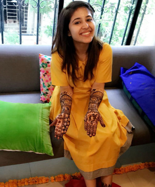 Masaan actress Shweta Tripathi is all set to tie the knot with rapper Chaitanya Sharma aka Slow Cheeta. The couple had a private mehendi ceremony at the rapper’s house yesterday. It was a fun filled and chilled out event, with the bride-to-be looking adorable in a yellow mid length dress. The bridal mehendi was a reflection of the couple as the theme for the occasion was their love story. On her right hand, Shweta has a rollercoaster, as that’s where Cheeta had asked her out when they first started dating and on her left hand she has a plane their love story began on a flight. Shweta Tripathi,Shweta Tripathi Mehendi ceremony,Shweta Tripathi Mehendi ceremony pics,Shweta Tripathi Mehendi ceremony images,Shweta Tripathi Mehendi ceremony stils,Chaitanya Sharma,Shweta Tripathi wedding,Shweta Tripathi marriage