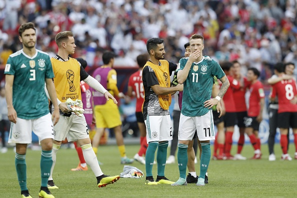 South Korea, as expectedly, deployed counter-attacking strategy to foil the German heavyweights. South Korea had only 31 per cent of ball possession in the match, and attempted only 251 passes, a third less than Germany. But those statistics weren't important as the final score. Against Germany, South Korea used a defensive lineup. With the absence of their midfield orchestrator and team captain, Ki Sung-yueng, South Korea started with 4-4-2 setup, but there was a twist as usual. Jang Hyun-soo, who started last two matches as a center back, protected back four as defensive midfielder, hoping his defensive efforts could work in the midfield against German technicians. Koo Ja-cheol, who is with German Bundesliga side FC Augsburg, played behind Son Heung-min, another South Korean player who is familiar with Germans with his stints at Hamburg and Bayer Leverkusen. As many would have predicted, Germany, who played with a 4-4-2 formation and made five changes to their starting line-up that defeated Sweden 2-1 in the last match, dominated possession from the midfield and ran the game carefully. Germany crashes out of FIFA World Cup,Germany out,Germany out of World Cup,South Korea,South Korea beats Germany,FIFA World Cup,FIFA World Cup 2018