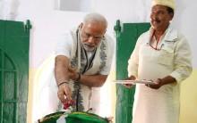 Prime Minister Narendra Modi on Thursday offered floral tributes at the 'samadhi' and 'mazaar' of the 15th-century saint Kabir Das at Maghar in Sant Kabir Nagar district in Uttar Pradesh. Modi became the first Prime Minister to visit Maghar, where the mystic poet and saint breathed his last in 1518. Dressed in white kurta and choodidaar payjama, the Prime Minister was flanked by the saffron-robed Uttar Pradesh Chief Minister Yogi Aditytanath and priests at the shrine as he took a round of the place. He was gifted a 'angawastra' and some literature on the saint. Officials present with the Chief Minister told IANS that Modi took keen interest in knowing the details of Maghar even as he surprised many with his in-depth knowledge of the saint who is revered equally by Hindus and Muslims.