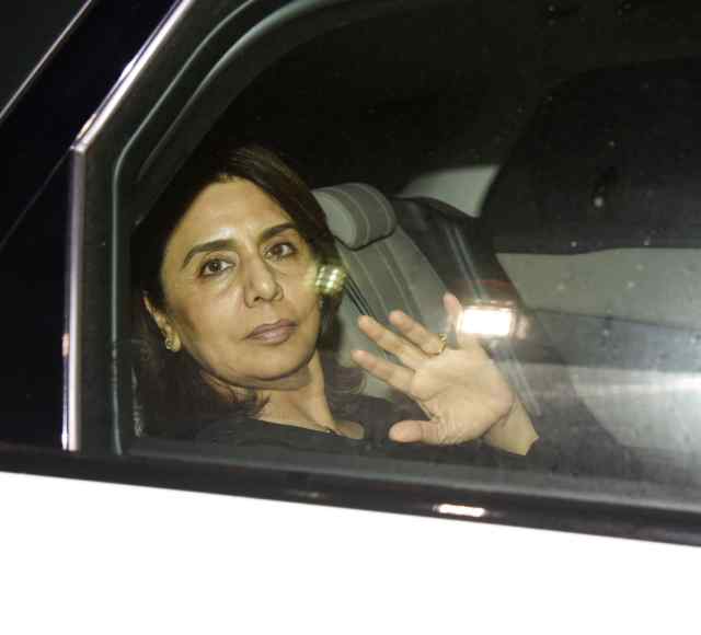 Neetu Kapoor poses for photographers on her arrival at Sanju special screening in Mumbai. Sanju special screening,Sanju special screening pics,Sanju special screening images,Sanjay Dutt,Ranbir Kapoor,Manisha Koirala,Sanju special screening stills
