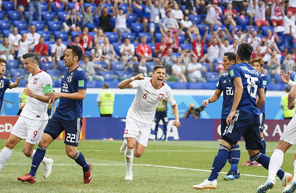 Japan lost 0-1 to Poland in their final Group H contest here on Thursday but still managed to go through to the FIFA World Cup pre-quarterfinals. Following the loss, thanks to Jan Bednarek's 59th-minute strike, Japan have four points -- the same as third-placed Senegal but the Asian powerhouse are ranked second in the group on the basis of fair play (number of yellow and red cards collected). Colombia, who defeated Senegal 1-0 in Samara, topped Group H with six points. Poland have three points from three games and are in the fourth and final spot in the group. FIFA World Cup,Japan enter pre-quarters,Japan beats Poland,FIFA World Cup pre-quarterfinals,Group H,2018 FIFA World Cup,FIFA World Cup 2018