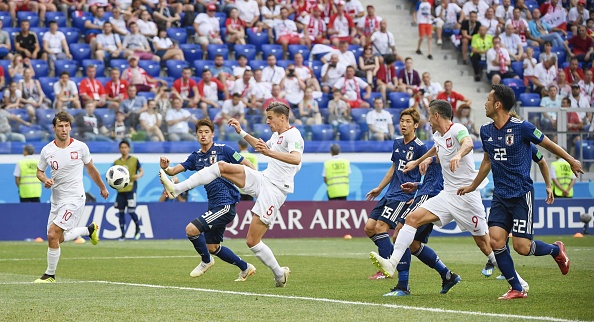 Jan Bednarek (3rd from L) of Poland scores during the second half of a World Cup Group H match in Volgograd in Russia on June 28, 2018. Japan advanced to the round of 16 despite a 1-0 loss to Poland. FIFA World Cup,Japan enter pre-quarters,Japan beats Poland,FIFA World Cup pre-quarterfinals,Group H,2018 FIFA World Cup,FIFA World Cup 2018