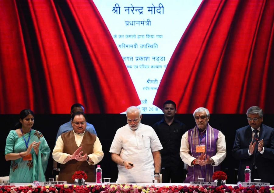 Prime Minister Narendra Modi on Friday claimed his government has proposed and approved more numbers of All India Institutes of Medical Sciences (AIIMS) in the past four years than there had been in the last 70 years. Modi was speaking at the AIIMS here. He inaugurated a tunnel connecting the main building to its trauma facility. The one-km long motorable tunnel will facilitate the transfer of the patients and their relatives, doctors, instruments and medicine between AIIMS, Ansari Nagar and Trauma Centre. "We want to provide the best healthcare to our people at the lowest possible cost. We have proposed and approved more numbers of AIIMS than it was done in the past 70 years," Modi said. PM Narendra Modi,Narendra Modi,National Centre,AIIMS,National Centre for Ageing at AIIMS,AIIMS Foundation Stone,Modi