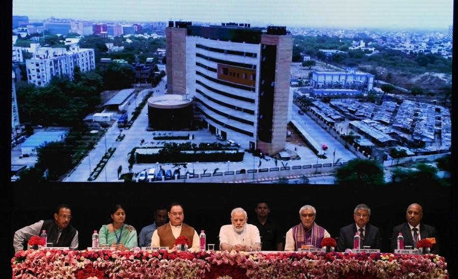 At Safdarjung Hospital, Modi inaugurated a 555-bed super-speciality block and a 500-bed emergency block. "Over Rs 1,300 crore was spend on the Safdarjung Hospital to make it technologically advance," he said. PM Narendra Modi,Narendra Modi,National Centre,AIIMS,National Centre for Ageing at AIIMS,AIIMS Foundation Stone,Modi