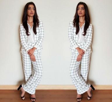 Actress Radhika Apte who is riding high with great reviews she has been getting for her last release Lust Stories is defiantly setting a mark higher with her outfits while promoting her next Sacred games. The actress has been recently wearing some casual outfits and made them look sexy. Yesterday at the premiere day of Sacred Games the actress wore back to back in 2 casual outfits which looked smoking hot. The first one was a white formal suit with thin black lining on it. She kept the look simple by doing minimal makeup and kept her hair open.