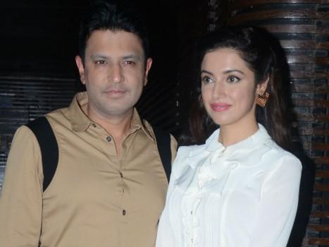 Producer Bhushan Kumar and Divya Khosla Kumar had recently attended Aanand L Rai's birthday celebration in Mumbai. Aanand L Rai celebrated his 47th birthday on Wednesday, the director hosted a bash which was attended by many celebrities. Celebrated producer Bhushan Kumar was amongst the guests who attended the party, Bhushan made an entry with his beautiful wife Divya Khosla Kumar. Bhushan was seen a wearing a  beige color designer shirt and black trousers and Divya Khosla Kumar was seen wearing a beautiful white frilled shirt and long length netted skirt. Bhushan Kumar's T-Series has been enjoying a golden run at the box office with back to back successes in the last two years. Out of the four films minting over 100 crores this quarter, the producer has two films to his credit with 'Sonu Ke Titu Ki Sweety' and 'Raid'.
