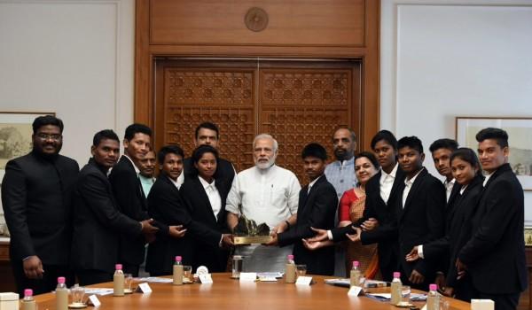 Prime Minister Narendra Modi on Friday met a group of tribal students from Maharashtra who had scaled Mt. Everest last month. The students were a part of a team of the 'Mission Shaurya' initiative of the Adivasi Vikas Vibhag of the Maharashtra government. Five students out of the group of 10 had successfully scaled the world's highest peak in May. The students shared their experiences during the training and ascent of Mt. Everest. The Prime Minister congratulated the students on their achievements. Felicitating the students, he exhorted them to take up a sports and pursue it regularly. Maharashtra Chief Minister Devendra Fadnavis was also present on the occasion.