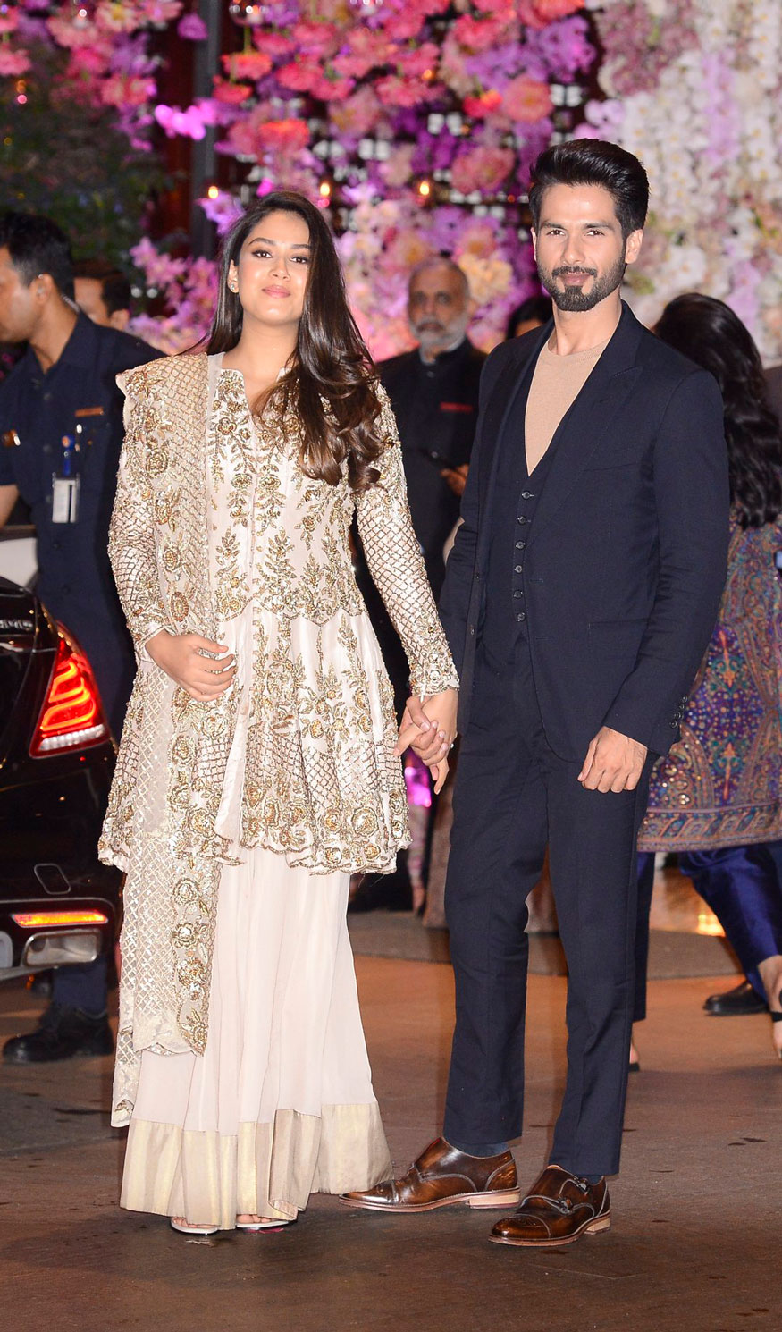 Shahid Kapoor and his wife Mira Rajput pose together as they arrive for Akash Ambani and Shloka Mehta's engagement party in Mumbai. Shah Rukh Khan,Aamir Khan,Abhishek Bachchan,Aishwarya Rai,Alia Bhatt,Ranbir Kapoor,Akash Ambani and Shloka Mehta's engagement,Akash Ambani and Shloka Mehta's engagement party,Akash Ambani engagement party,Shloka Mehta engagement party