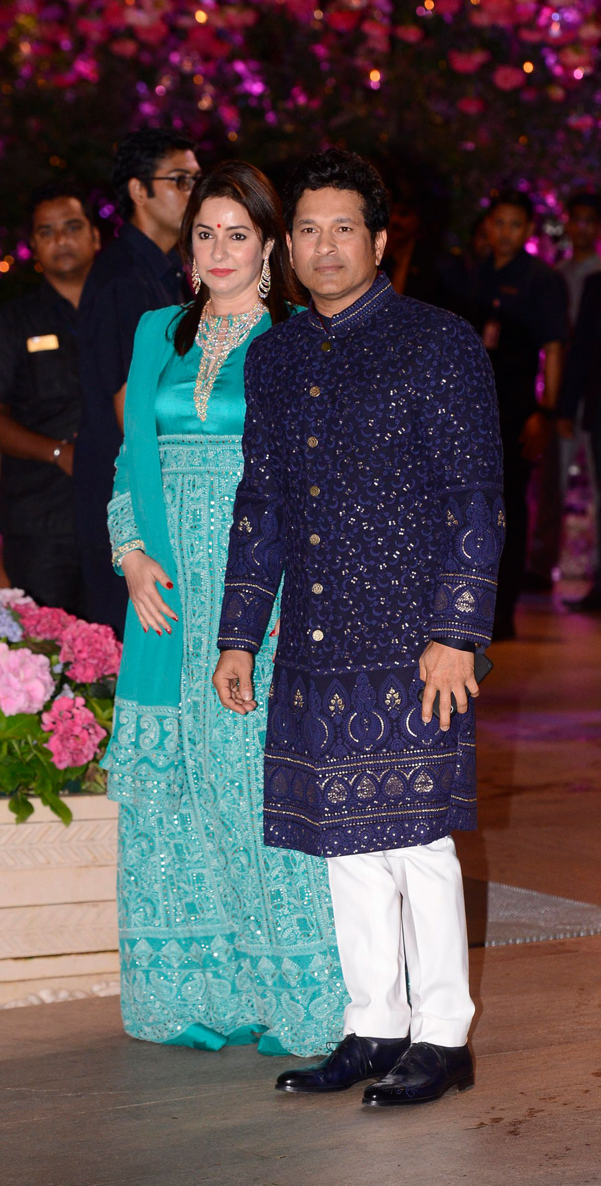 Sachin Tendulkar and his wife Anjali Tendulkar pose together as they arrive for Akash Ambani and Shloka Mehta's engagement party in Mumbai. Shah Rukh Khan,Aamir Khan,Abhishek Bachchan,Aishwarya Rai,Alia Bhatt,Ranbir Kapoor,Akash Ambani and Shloka Mehta's engagement,Akash Ambani and Shloka Mehta's engagement party,Akash Ambani engagement party,Shloka Mehta engagement party