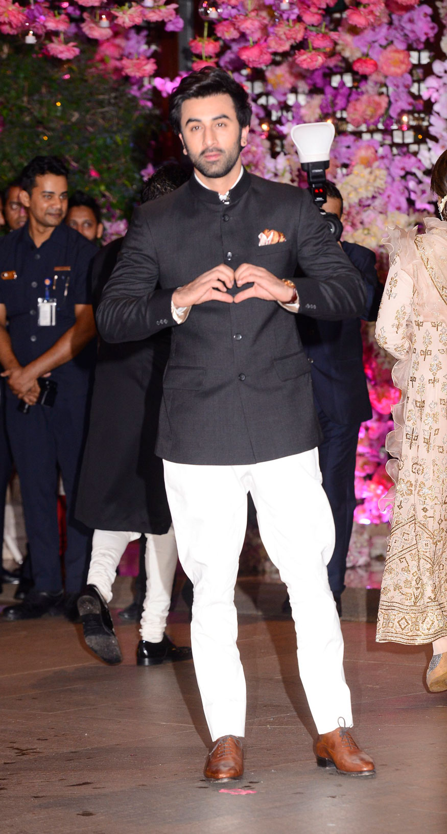 Ranbir Kapoor looked dapper in a black bandhgala. He made a stylish entry with his mother Neetu Singh Kapoor and filmmaker friend Ayan Mukherji. Shah Rukh Khan,Aamir Khan,Abhishek Bachchan,Aishwarya Rai,Alia Bhatt,Ranbir Kapoor,Akash Ambani and Shloka Mehta's engagement,Akash Ambani and Shloka Mehta's engagement party,Akash Ambani engagement party,Shloka Mehta engagement party