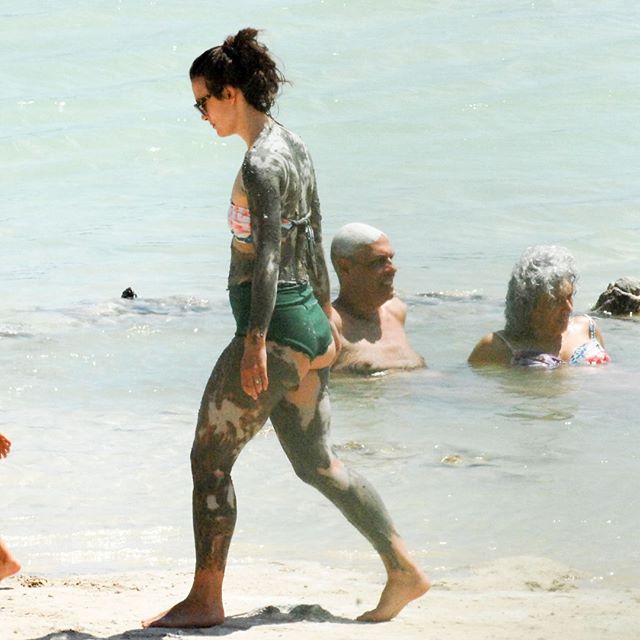 Her husband wore a pair of black floral swimming trunks and a pair of blue reflective sunglasses. Keira Knightley,Keira Knightley abs,Keira Knightley washboard abs,James Righton,Keira Knightley and James Righton,Keira Knightley curves,Keira Knightley hot curves