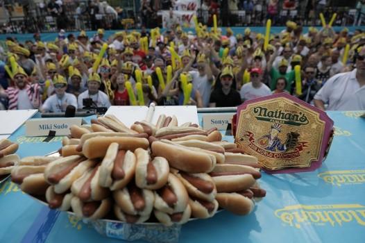 Defending champion Joey Chestnut broke his own world record at 2018 Nathan's Famous Hot Dog Eating Contest with a new hot-dog eating record by eating 74 hot dogs in 10 minutes! On the women's side, Miki Sudo brought home the title for the fifth time in a row, devouring 37 hot dogs.