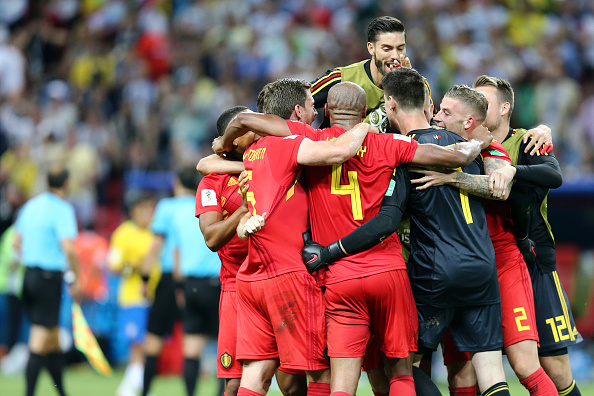 After the clearance, Belgium raced off for a counter-attack, with De Bruyne teeing up Hazard on the edge of the Brazil box. Hazard's shot was blocked by goalkeeper Alisson Becker. Chadli's rebound shot went wide of the left post. This action gave a sign of how Belgium were approaching the game. Another counter-attack led to a corner six minutes later. A corner, whipped by Belgium captain Hazard from the left flew into the Brazilian net off Fernandinho's right arm near the left post, catching Alisson out of position. Later, Philippe Coutinho and Marcelo tested Belgium goal-keeper Thibaut Courtois with long-range drives but the latter was alert, as Belgium, who played three central defenders in Jan Vertonghen, Vincent Kompany and Toby Alderweireld dealt Brazilian moves with patience and calmness. The European team doubled their lead in the 31st minute when Lukaku opened up a counter-attack following a corner. After Marouane Fellaini headed away Neymar's corner, Lukaku ran away down the middle of the pitch before rolling a pass right to De Bruyne, who launched a low screamer into the bottom left. FIFA World Cup,Belgium eliminate Brazil,Belgium beats Brazil,Belgium enter semis,FIFA World Cup 2018