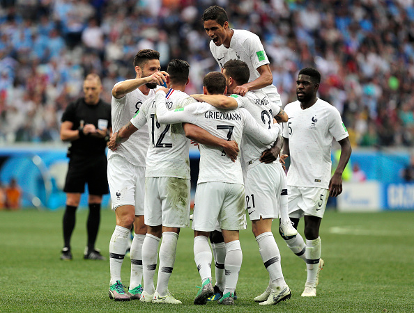 France finally broke Uruguay's resistance in the 40th minute after Rodrigo Bentancur hacked down Tolisso. The Juventus midfielder was shown a yellow card for the offense, meaning he will be unavailable in the semi-finals, should Uruguay progress. Griezmann's delivery from the resultant set piece was inch-perfect and Varane rose highest to head the ball into the bottom left corner. FIFA World Cup 2018,FIFA World Cup,France beats Uruguay,France trash Uruguay,France enters semis,FIFA World Cup pics,FIFA World Cup images,FIFA World Cup stills,FIFA World Cup pictures