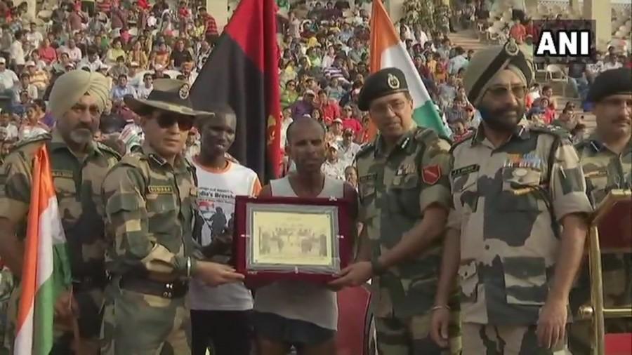 Ultra-Marathon runner Sameer Singh, who completed marathon run of 13,750 Km in a span of seven months and six days, was felicitated at Attari-Wagah border on Friday. He had registered himself in 'Bharat Ke Veer' app and travelled all around the country to complete his run. Sameer began his journey on December 1 from Wagah before he travelled towards Kanyakumari, Kolkata, all the states of North-East, Nepal border, and from the Himalayas he reached Jammu through Srinagar. He faced all the tough climates and challenges to scale distance of 13,750 km across India. Ultra-Marathon runner Sameer Singh,Ultra-Marathon runner,Sameer Singh,Sameer Singh gets felicitated,Attari-Wagah border