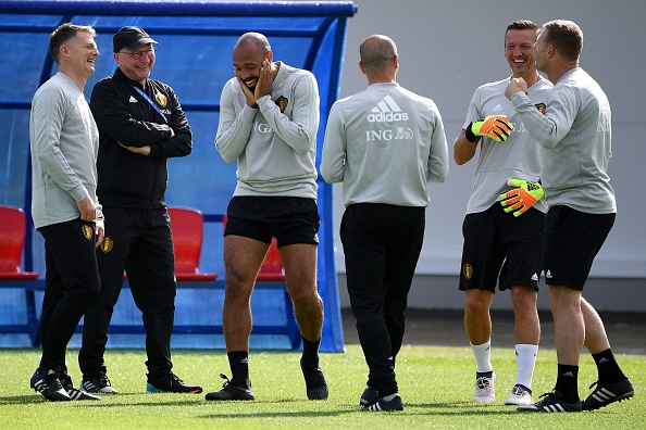 Belgium's assistant coach Thierry Henry (C) jokes with staff members during a training session of Belgium's national football team at the Guchkovo Stadium in Dedovsk, outside Moscow, on July 8, 2018, ahead of their Russia 2018 World Cup semi-final football match against France. FIFA World Cup,FIFA World Cup 2018,Belgium begin preparations,Belgium vs France,Belgium vs France semi-final,Belgium vs France semi-final pics,Belgium vs France semi-final images,Belgium vs France semi-final stills