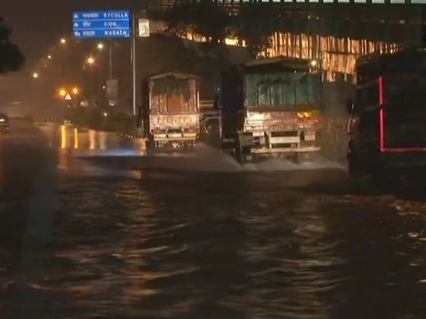 Train service have been disrupted as incessant rains continue to lash Mumbai and adjoining areas. "Due to heavy rains, Up and Down through line at Nala Sopara is halted. However, local trains on Western Suburbs are running late by 10 to 15 minutes between Virar to Churchgate," said Divisional Railway Manager, Western railway, on Tuesday morning. Streets at Gandhi Market, Sion Panvel Highway, Chembur, and Vadala were waterlogged as rain continued to lash the region. The downpours also lead to houses being water-logged in Palghar, causing inconvenience to the people. Mumbai rain,mumbai rains update,mumbai rainfall,Mumbai rainfall pics,Mumbai rainfall images,Mumbai rainfall stills
