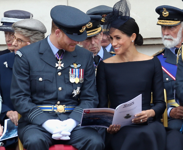 Meghan, Duchess of Sussex and Prince Harry, Duke of Sussex at Buckingham Palace, as members of the Royal Family attend events to mark the centenary of the RAF on July 10, 2018 in London, England. Royal Air Force,Royal Air Force 100th Anniversary,Prince Charles,Prince of Wales,Prince Andrew,Duke of York,Camilla,Duchess of Cornwall,Queen Elizabeth II,Meghan,Duchess of Sussex,Prince Harry