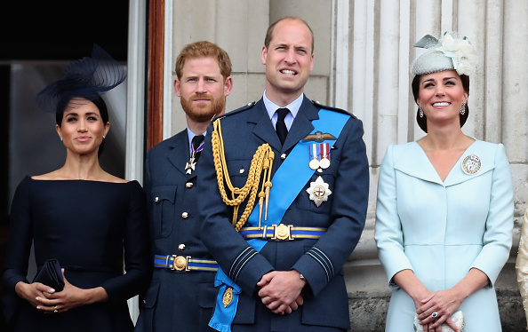 (L-R) Meghan, Duchess of Sussex, Prince Harry, Duke of Sussex, Prince William, Duke of Cambridge and Catherine, Duchess of Cambridge watch the RAF flypast on the balcony of Buckingham Palace, as members of the Royal Family attend events to mark the centenary of the RAF on July 10, 2018 in London, England. Royal Air Force,Royal Air Force 100th Anniversary,Prince Charles,Prince of Wales,Prince Andrew,Duke of York,Camilla,Duchess of Cornwall,Queen Elizabeth II,Meghan,Duchess of Sussex,Prince Harry