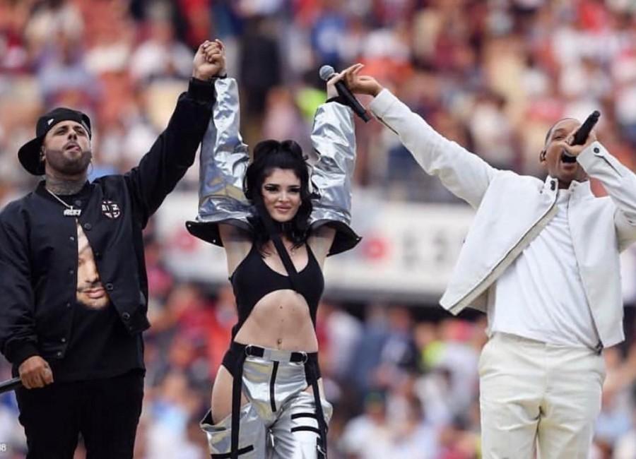 At one point in the 15-minute ceremony, Ronaldinho surprised the audience by showing up on the field playing a tall, wooden, Afro-Brazilian hand drum known as an atabaque, and was greeted with enthusiasm by the fans inside Moscow's Luzhniki Stadium. FIFA World Cup closing ceremony,World Cup closing ceremony,Ronaldinho,Will Smith