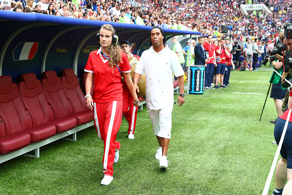 Ronaldinho walks on the pitch prior to the 2018 FIFA World Cup Final between France and Croatia at Luzhniki Stadium on July 15, 2018 in Moscow, Russia. FIFA World Cup closing ceremony,World Cup closing ceremony,Ronaldinho,Will Smith