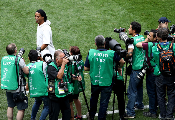 FIFA Legend, and former Brazil player, Ronaldinho walks out prior to the 2018 FIFA World Cup Final between France and Croatia at Luzhniki Stadium on July 15, 2018 in Moscow, Russia. FIFA World Cup closing ceremony,World Cup closing ceremony,Ronaldinho,Will Smith