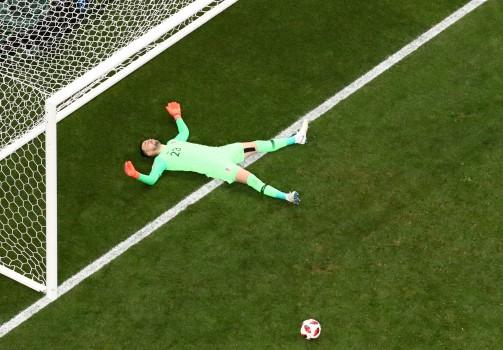 Croatia's Danijel Subasic reacts as France's Paul Pogba scores their third goal