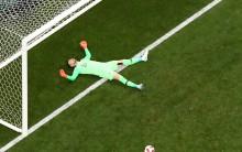 Croatia's Danijel Subasic reacts as France's Paul Pogba scores their third goal