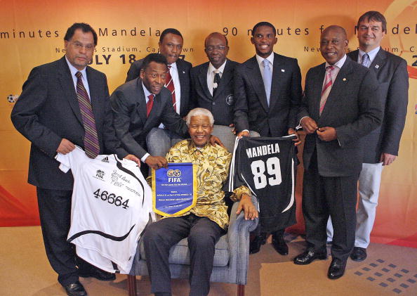 Former South Africa President, Nelson Mandela, is awarded a playing jersey by (from L) SA 2010 LOC CEO, Danny Jordaan, Brazilian football legend Pele, SA 2010 LOC Chairman, Irvin Khoza, FIFA Vice President, Jack Warner, Cameroon and Barcelona striker, Samuel Eto'o, SA LOC Board member Tokyo Sekwale and Jerome Champagne (Delegate of the FIFA President for Special Affairs), which will be used by the African and FIFA Invitation teams during the '90 Minutes for Mandela' match, which will be played at Newlands Stadium in Cape Town on 18 July. The match forms part of the festivities honour Mandela, who turns 89 on 18 July. Nelson Mandela 100th birthday,Nelson Mandela birthday,Nelson Mandela rare pics,Nelson Mandela rare images,Nelson Mandela rare stills,Nelson Mandela rare pictures,Nelson Mandela rare photos,Nelson Mandela unseen pics,Nelson Mandela unseen images,Nelson Man