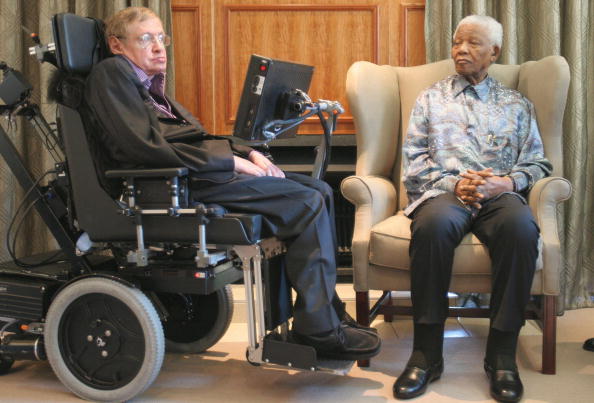 South Africa former President Nelson Mandela (R) meets with British scientist Professor Stephen Hawking (L) in Johannesburg on May 15, 2008. Hawking, who has devoted his career to finding the origins of the universe, is in the country to begin a search for Africa's answer to Einstein. Some of the world's leading high-tech entrepreneurs and scientists have backed a 75m plan to create Africa's first postgraduate centres for advanced math and physics, after the British government declined to provide funding. Nelson Mandela 100th birthday,Nelson Mandela birthday,Nelson Mandela rare pics,Nelson Mandela rare images,Nelson Mandela rare stills,Nelson Mandela rare pictures,Nelson Mandela rare photos,Nelson Mandela unseen pics,Nelson Mandela unseen images,Nelson Man