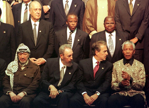 Cuban leader Fidel Castro and Colombian President Andres Pastrana turn towards South African President Nelson Mandela as Palestinian Authority President Yasser Arafat looks ahead during the group photo opportunity at the 12th Non-Aligned Movement (NAM) summit in Durban 02 September. Nelson Mandela 100th birthday,Nelson Mandela birthday,Nelson Mandela rare pics,Nelson Mandela rare images,Nelson Mandela rare stills,Nelson Mandela rare pictures,Nelson Mandela rare photos,Nelson Mandela unseen pics,Nelson Mandela unseen images,Nelson Man