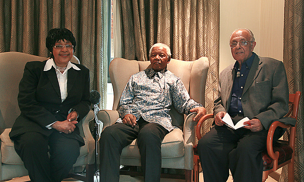 Former South African President Nelson Mandela (C) is pictured with South African independence veteran Ahmed Kathrada (R) and his ex-wife anti-apartheid campaigner Winnie Mandela on March 14, 2008. in Johannesburg as part of celebrations for Mandela 90th birthday later this year. The Nobel laureate was one of eight people jailed for life after the Rivonia Trial, spending 27 years behind bars until his release in 1990. Nelson Mandela 100th birthday,Nelson Mandela birthday,Nelson Mandela rare pics,Nelson Mandela rare images,Nelson Mandela rare stills,Nelson Mandela rare pictures,Nelson Mandela rare photos,Nelson Mandela unseen pics,Nelson Mandela unseen images,Nelson Man