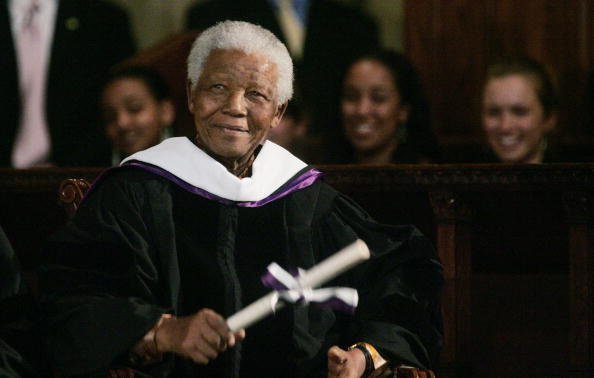 Former South African president Nelson Mandela smiles after receiving an honorary degree from Amherst College at St. Bartholomew Church May 12, 2005 in New York City. Mandela, who was imprisoned for 27 years under the apartheid regime, is a recipient of the Nobel Peace prize. Nelson Mandela 100th birthday,Nelson Mandela birthday,Nelson Mandela rare pics,Nelson Mandela rare images,Nelson Mandela rare stills,Nelson Mandela rare pictures,Nelson Mandela rare photos,Nelson Mandela unseen pics,Nelson Mandela unseen images,Nelson Man