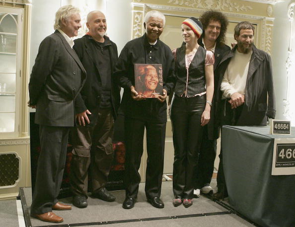 Nelson Mandela and 46664 Ambassadors (L-R Roger Taylor, Peter Gabriel, Nelson Mandela, Annie Lennox, Brian May and Yusuf Islam) attend VIP reception launching the December 2 publication of coffee table book '46664 The Concert' at The Dorchester Hotel on November 25, 2004 in London. The book includes photography from the rehearsals and lead-up to the concert in November last year, together with quotes from all the participating artists, which included Bono, Dave Stewart, Queen and Anastasia. 46664 is Mandela's campaign to help raise Global awareness of AIDS and HIV. Nelson Mandela 100th birthday,Nelson Mandela birthday,Nelson Mandela rare pics,Nelson Mandela rare images,Nelson Mandela rare stills,Nelson Mandela rare pictures,Nelson Mandela rare photos,Nelson Mandela unseen pics,Nelson Mandela unseen images,Nelson Man