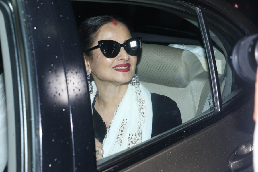 Rekha waves as she leaves after watching Dhadak special screening in Mumbai. Rekha,Madhuri Dixit,Shahid Kapoor,Sonakshi Sinha,Ishaan Khatter and Janhvi Kapoor,Ishaan Khatter,Janhvi Kapoor,Dhadak screening,Dhadak,Dhadak special screening,Dhadak special screening pics,Dhadak special screening images,Dhadak special screening stills