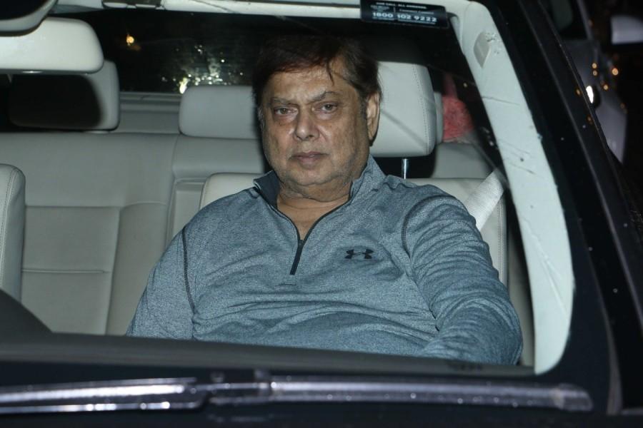 David Dhawan gestures for the cameras on his arrival at Dhadak special screening in Mumbai. Rekha,Madhuri Dixit,Shahid Kapoor,Sonakshi Sinha,Ishaan Khatter and Janhvi Kapoor,Ishaan Khatter,Janhvi Kapoor,Dhadak screening,Dhadak,Dhadak special screening,Dhadak special screening pics,Dhadak special screening images,Dhadak special screening stills