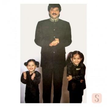 Sonam Kapoor Ahuja on Thursday treated her fans with an adorable throwback picture from her childhood. The 'Veere Di Wedding' star shared an image that features a young Sonam and sister Rhea, shyly posing with dad Anil Kapoor. She wrote alongside, 