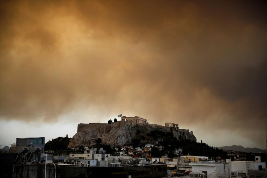 Orange smoke engulfs Greek capital Athens wildfire,Athens fire,Athens wildfire pics,Athens wildfire images,Greek capital,Orange smoke,Wildfire rages near Athens