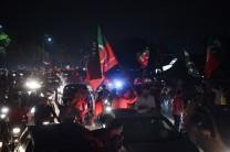 Imran Khan-led PTI supporters sense victory, celebrate on streets
